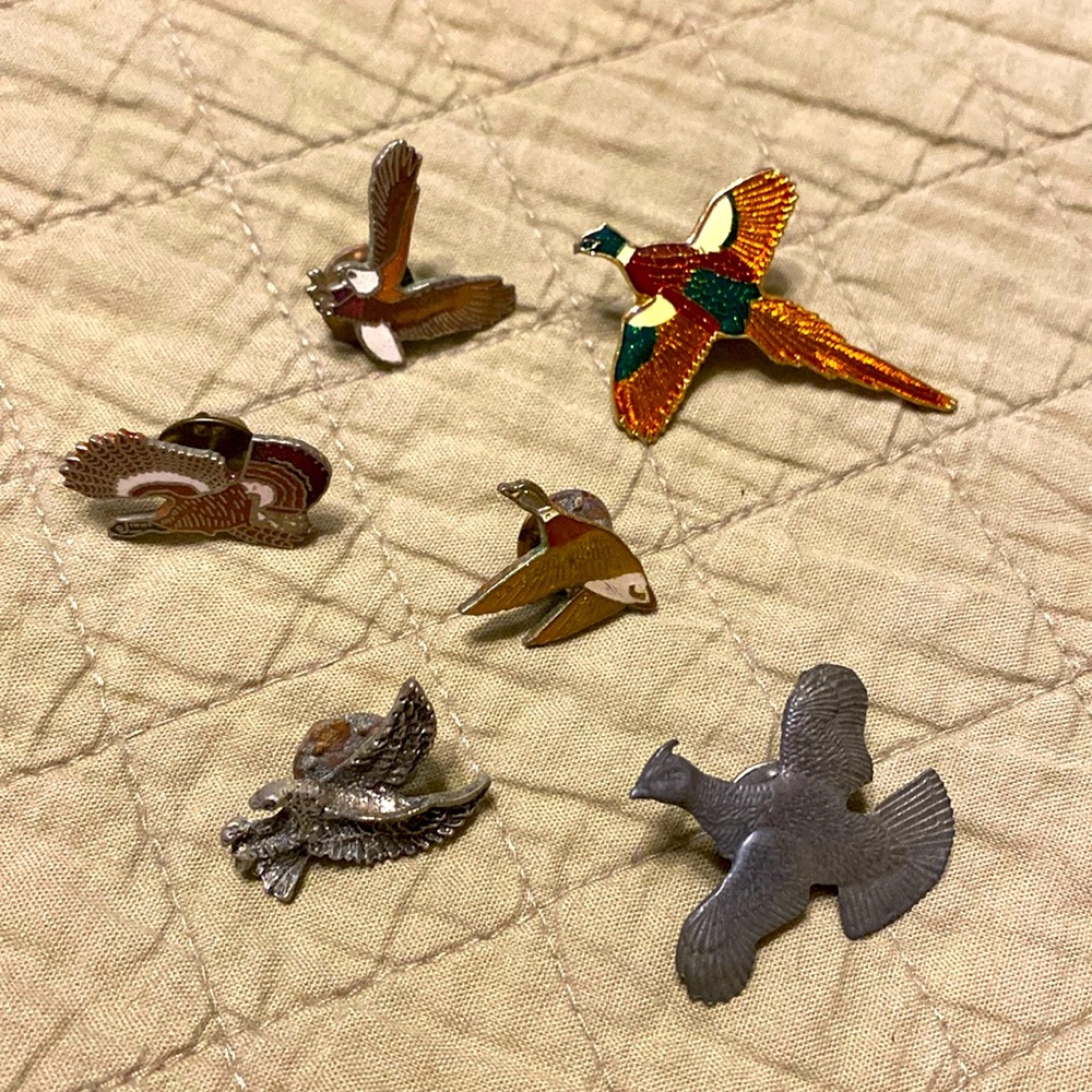 Lapel or hat pins.